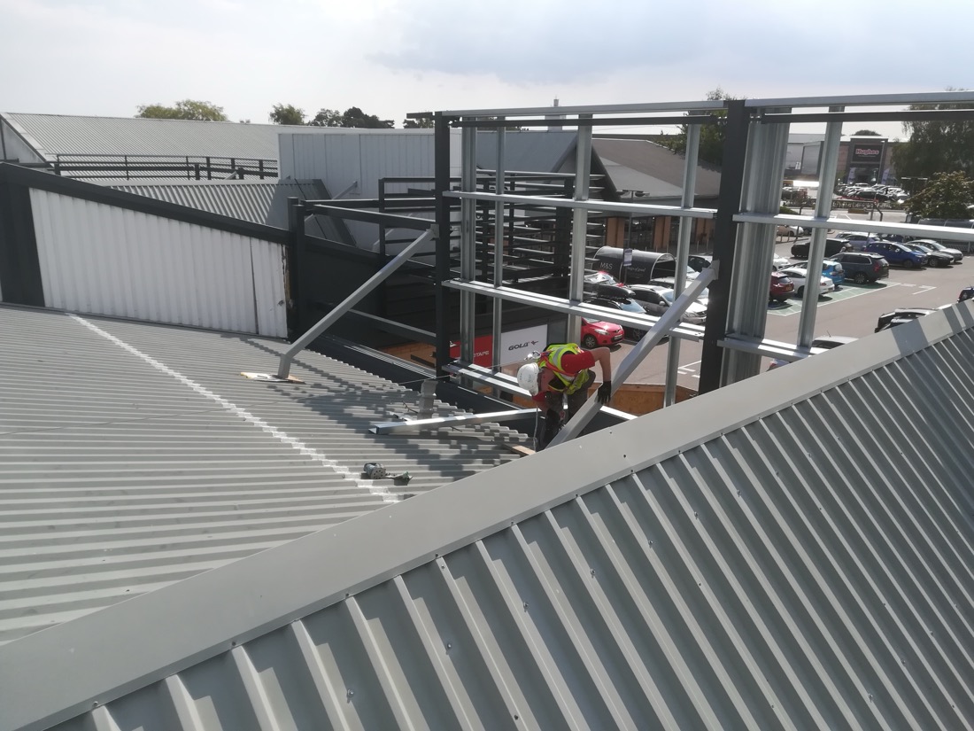Topps Tiles Working On Roof.jpg